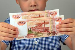 В России назвали заработки мошенников на атаках против детей